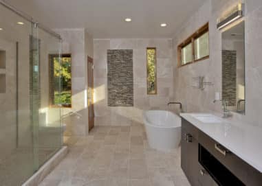 Modern bathroom with panel windows and a new door installation